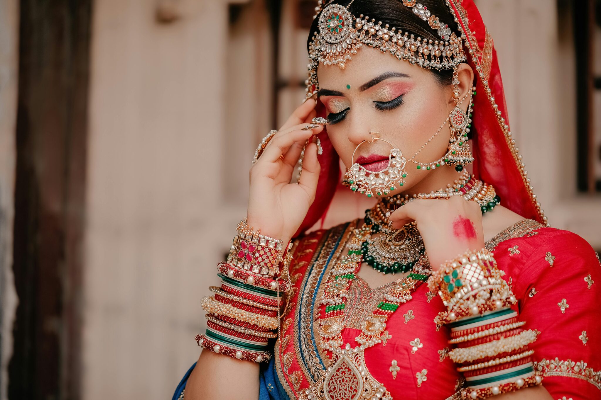 Beautiful Indian bride in ornate traditional dress and jewelry.